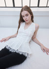HALTER-NECK PEPLUM BLOUSE