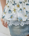 HALTER-NECK PEPLUM BLOUSE