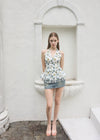 HALTER-NECK PEPLUM BLOUSE
